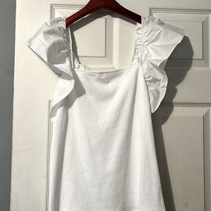 A white dressy tee with fun sleeves. Never worn